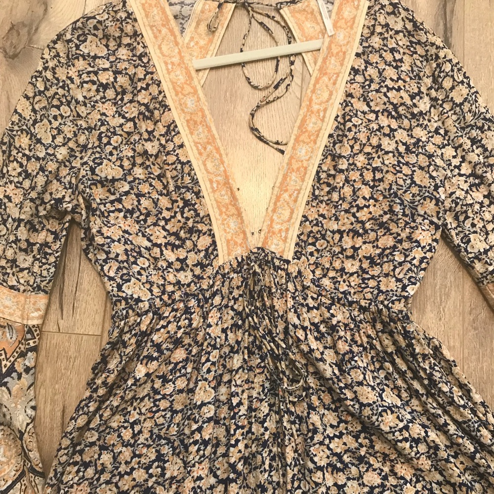 Long sleeve, backless, Free People romper.